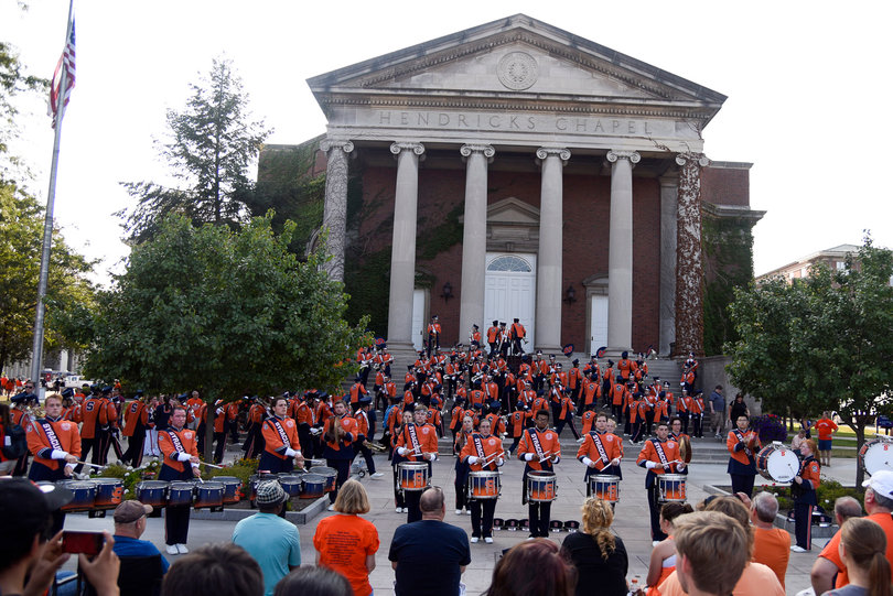 The marching band performs for fans outside of Hendricks Chapel before the game.