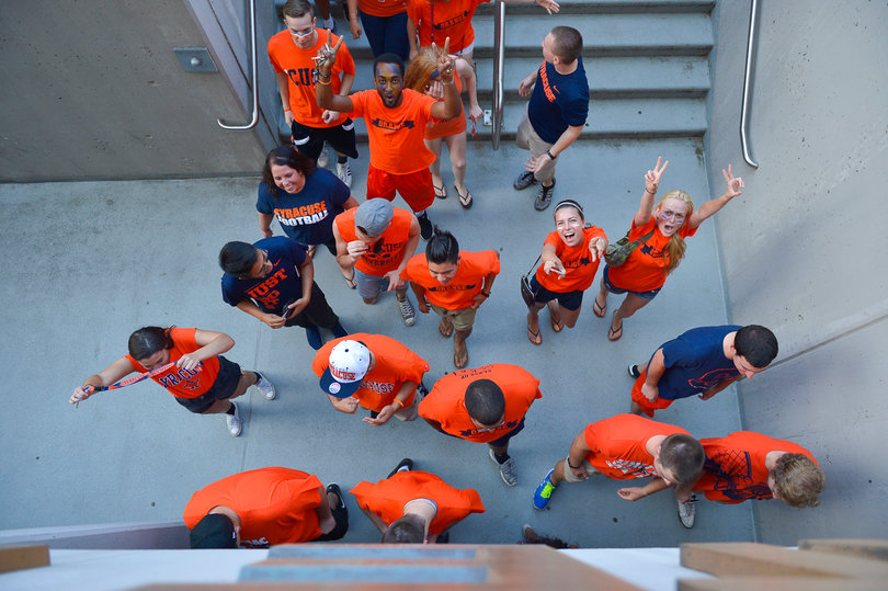 Students shuffle into the Carrier Dome. 