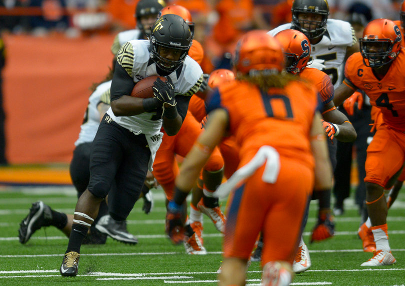 Syracuse safety Rodney Williams (6) waits as a Wake Forest player with the ball approaches him.