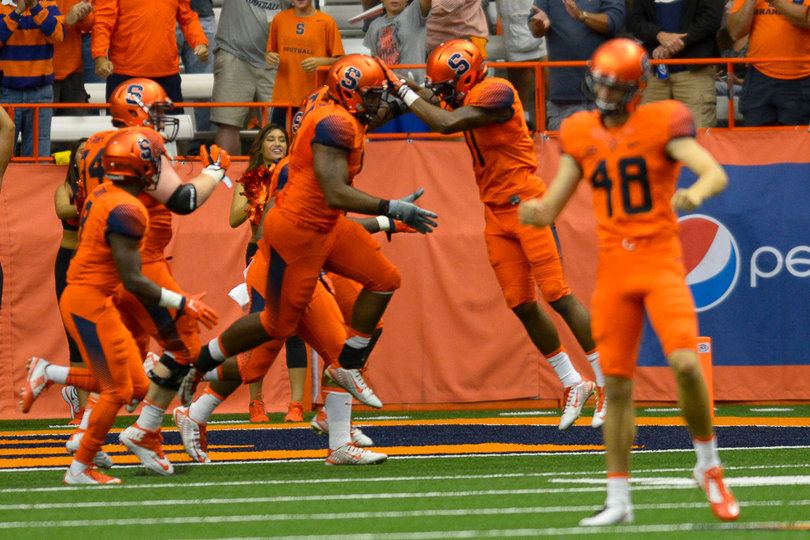Syracuse celebrates in the end zone after making a play against Wake Forest.