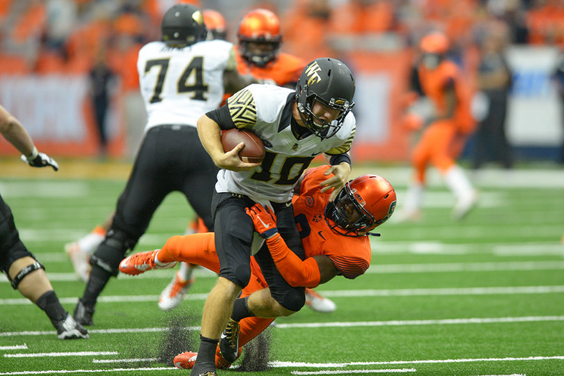Syracuse safety Antwan Cordy sacks WFU quarterback John Wolford late in the fourth quarter.