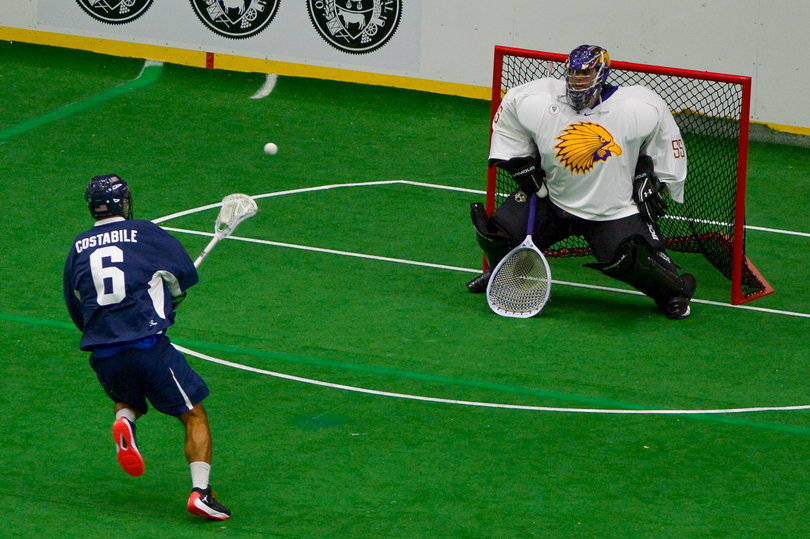 The Americans' CJ Costabile unloads a shot from a few yards beyond the crease. He had multiple open opportunities throughout the game.