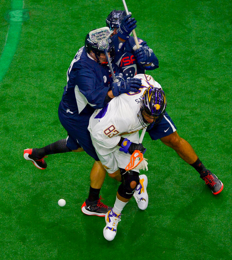 Former Syracuse attack Randy Staats (83) goes after the ball for the Iroquois. He contributed throughout the game with several behind-the-back passes.