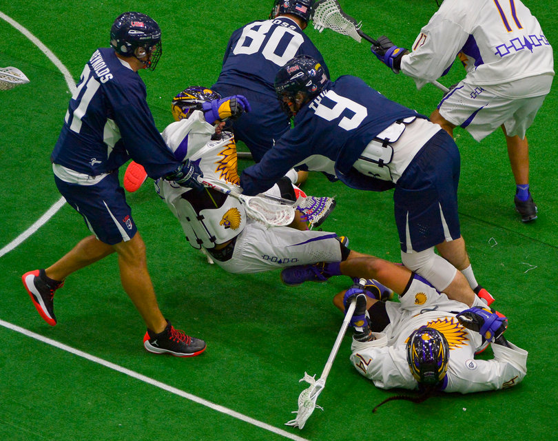 American Garrett Thul destroys an Iroquois player. It was one of many displays of physicality on Friday night.