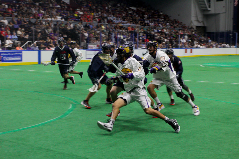 Lyle Thompson carries his stick in his left hand as he dashes toward the net. After the game, he said one of the halftime adjustments was for him to use his speed more.