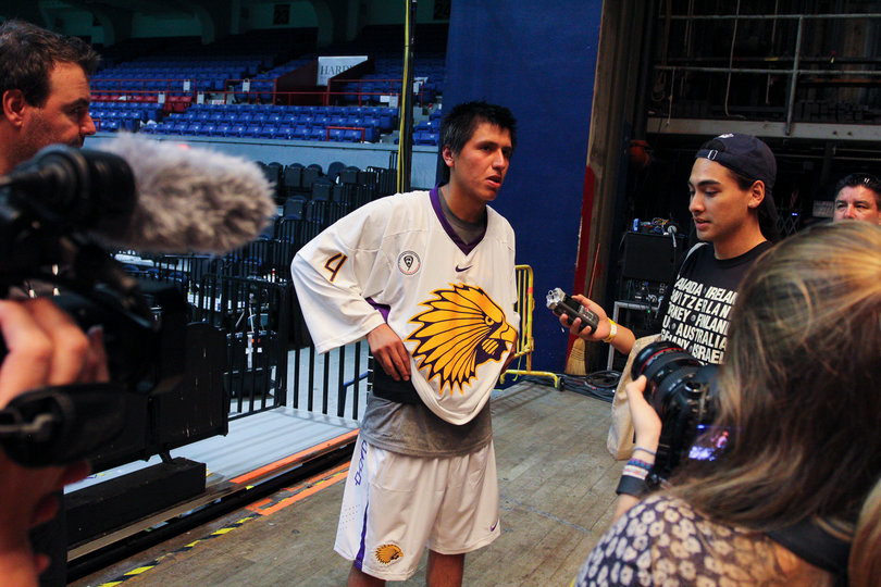 Lyle Thompson speaks with reporters after the game.