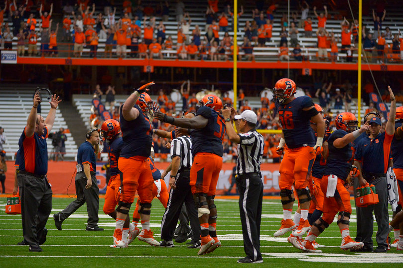Syracuse players celebrate the game-winner.