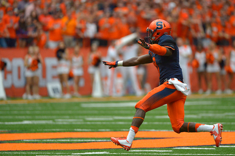 Antwan Cordy waves his hands during SU's 34-24 loss. He had a sack early in the game on LSU's Harris.