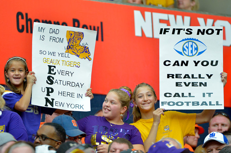 LSU fans reassert the Southeastern Conference's dominance in football in their signs. 