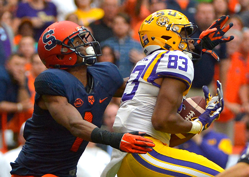 Dural (83) burns SU cornerback Julian Whigam, left. The 51-yard reception was Dural's only of the game, but helped set up LSU's touchdown on the next play.  
