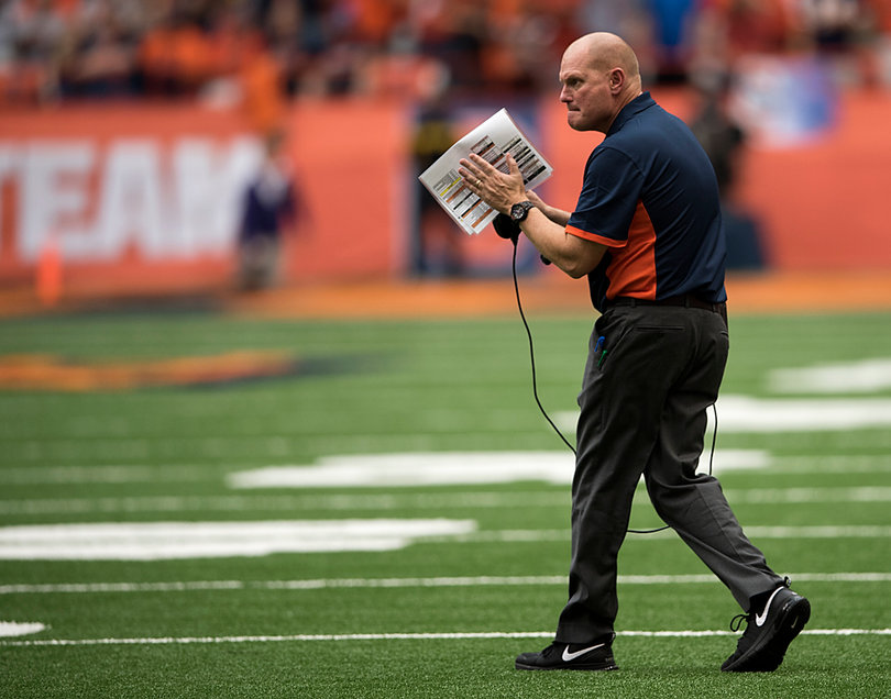 Syracuse head coach Scott Shafer claps during the loss. After the game, he said he expects SU to "win some of these games."  