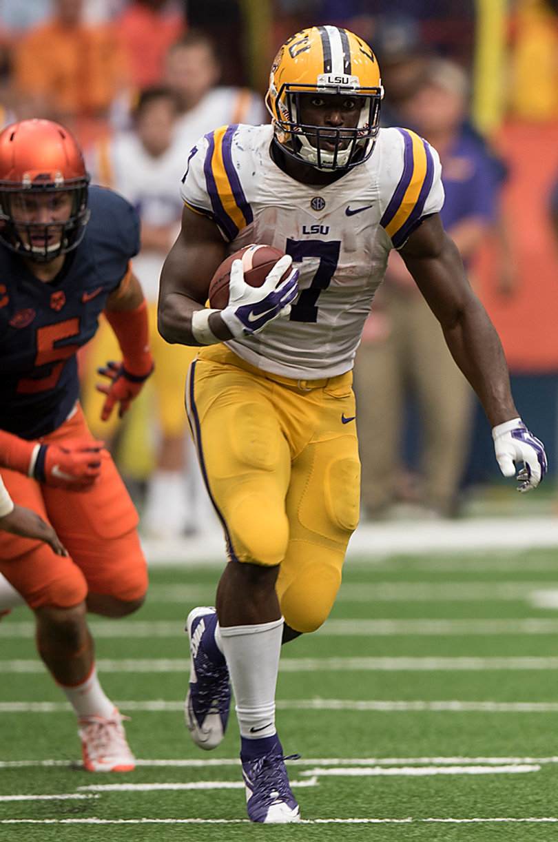 Fournette runs past Syracuse defensive end Luke Arciniega. He finished with 244 yards rushing on the day.