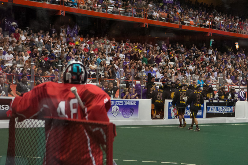 Canadian goalie Matt Vinc (48) leans on the net as several Iroquois players come off the field. Vinc saved 85 percent of the shots he faced. 