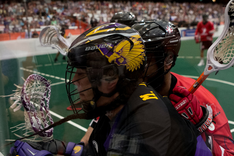 A Canadian player bears down on an Iroquois player   in a game where Canada allowed just eight goals. 