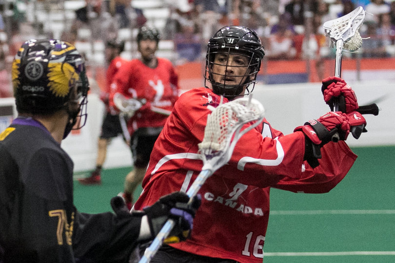 Canadian Chris Corbeil cocks back his arm in preparation to throw. 