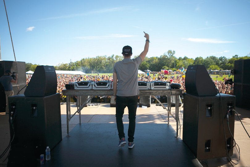 Romero pumps up the crowd before dropping the beat.