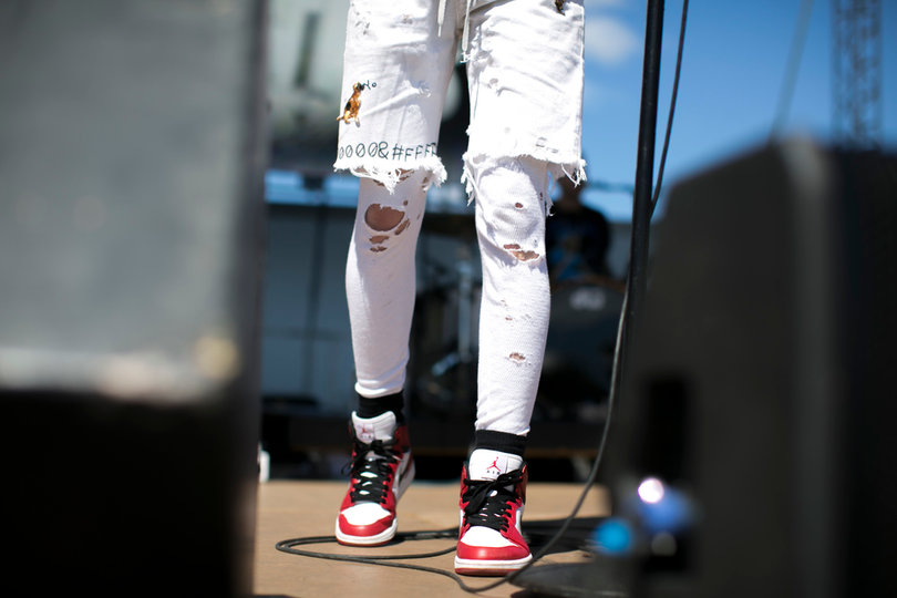Jesse Rutherford dances around the stage in his Air Jordans.
