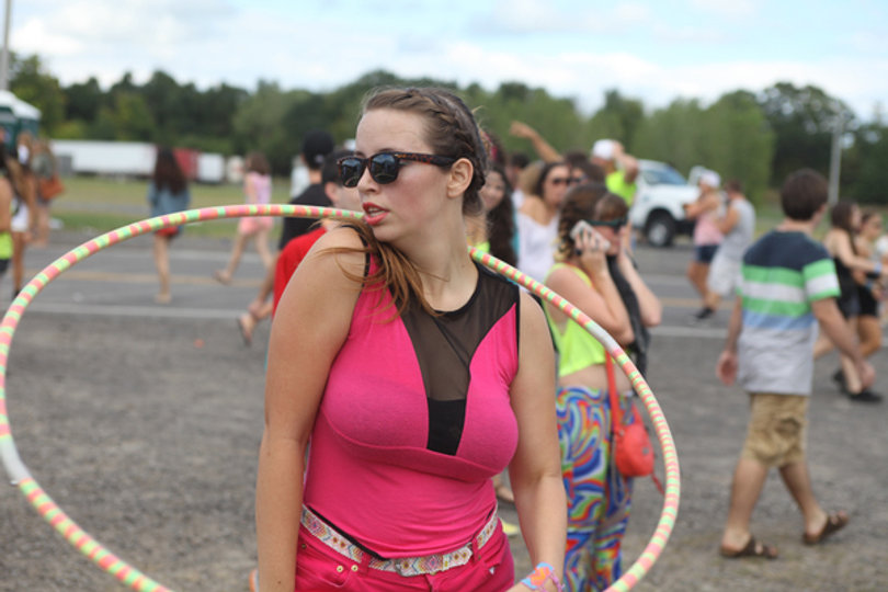 A raver shows off her hula hooping skills.
