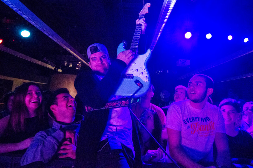 The energetic crowd goofed around during the show.