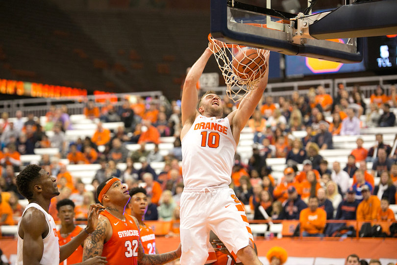 Syracuse's Trevor Cooney throws down a two-handed dunk during the intra-squad scrimmage.