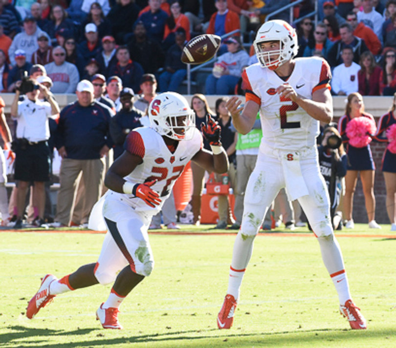 Dungey bobbles a snap during the first half of SU's loss to Virginia. 