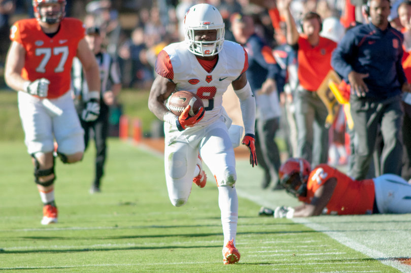 Cordy races down the sideline after scooping up Mizzell's fumble to give SU a 7-0 lead over UVA. 