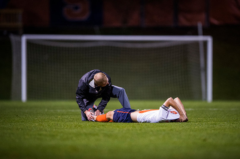Pasanen gets checked out by a trainer. He assisted the Orange's first goal.