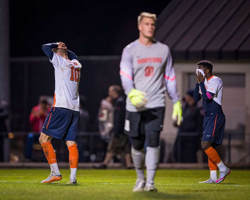 Buescher (left) and Chris Nanco react after Nanco missed a shot at SU Soccer Stadium.