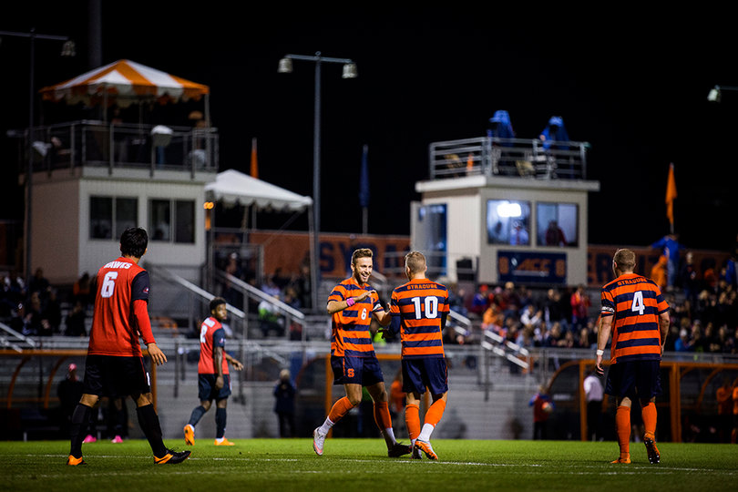 Syracuse celebrates after Buescher scored his first goal. Hartford answered with a goal of its own about three minutes later.