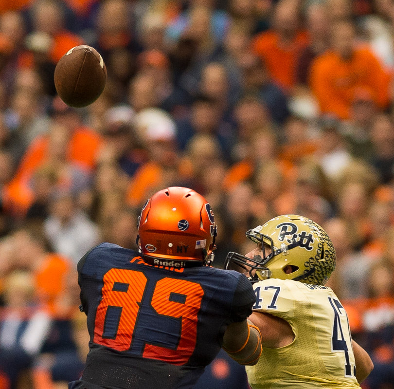 Pittsburgh linebacker Matt Galambos intercepts an Eric Dungey pass meant for SU tight end Josh Parris in the third quarter. 