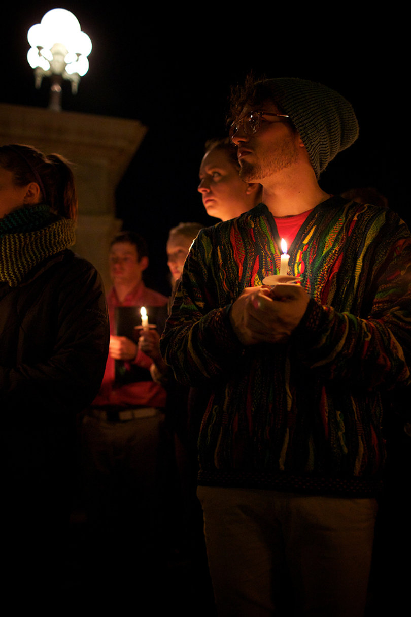 2012: Tom Badman, a sophomore physics and art dual major, listens as the names of the 35 Syracuse University students killed in the Pan Am Flight 103 bombing are read.