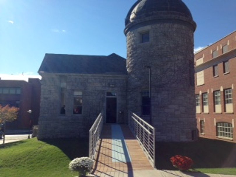 The Holden Observatory is 30 feet by 32 feet with a 30-foot high tower. A winding staircase leads up to the building's telescope and rotating dome.
