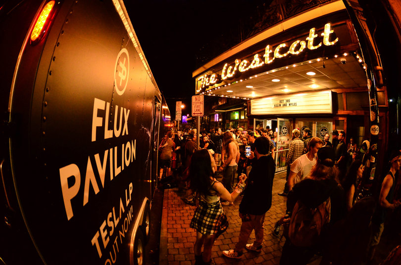 Concert goers wait outside the Westcott Theater to see Flux Pavilion. 