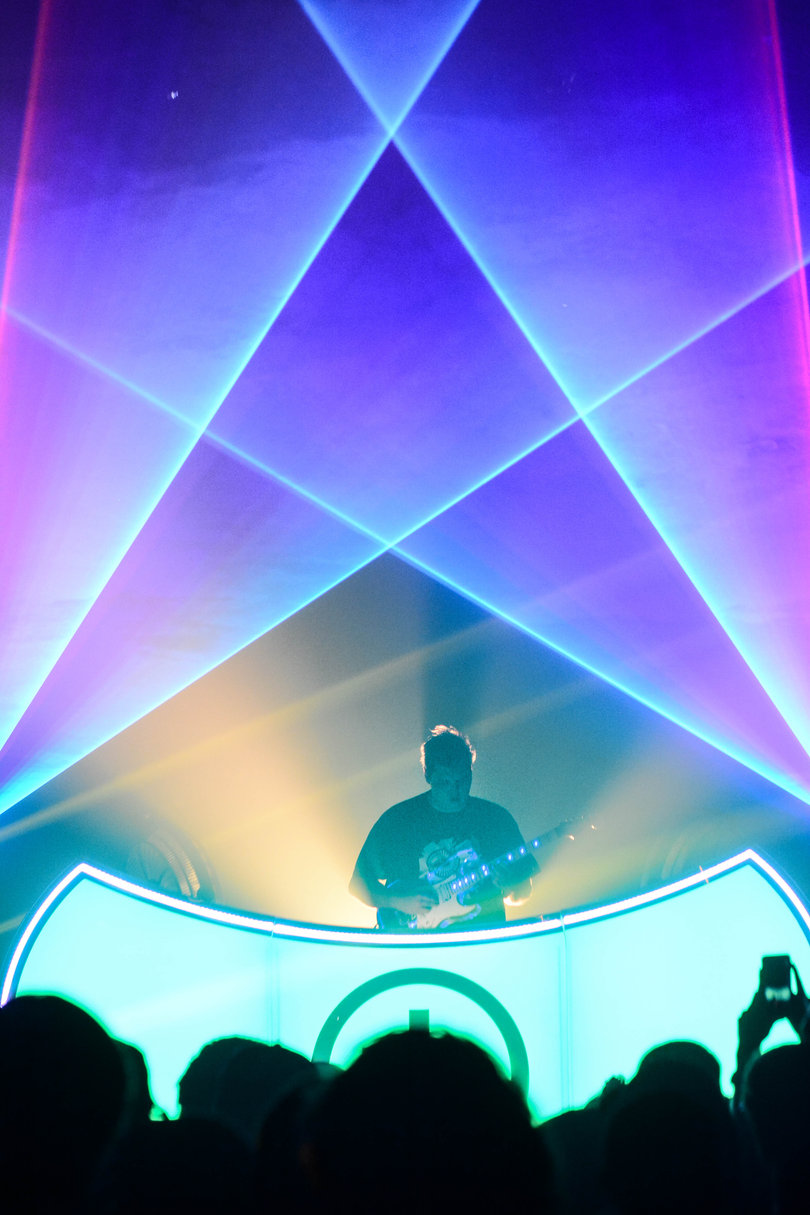 Flux Pavilion energizes the crowd with his guitar. 