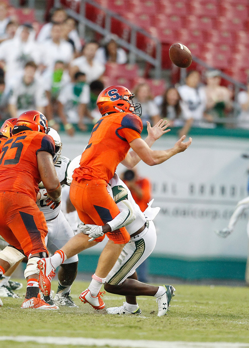 Dungey fumbles the ball while getting tackled by Nichols in the fourth quarter.
