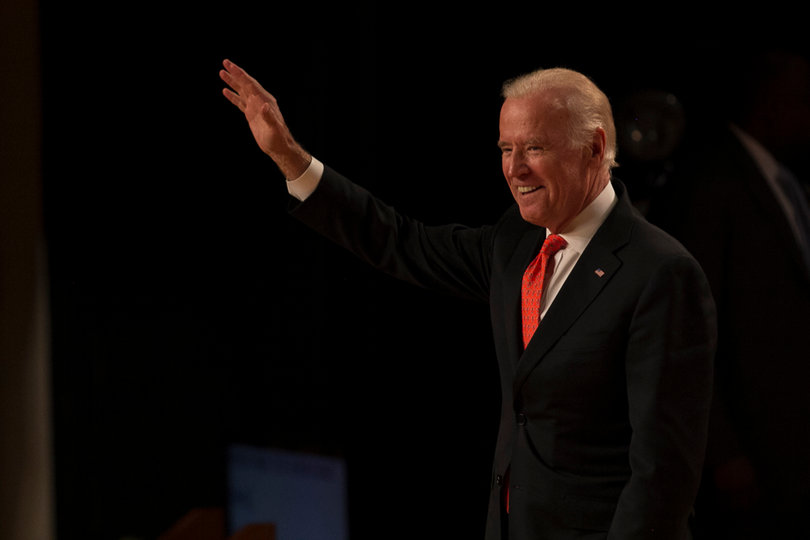 Biden waves to the crowd as he takes the stage for his speech about sexual assault prevention.