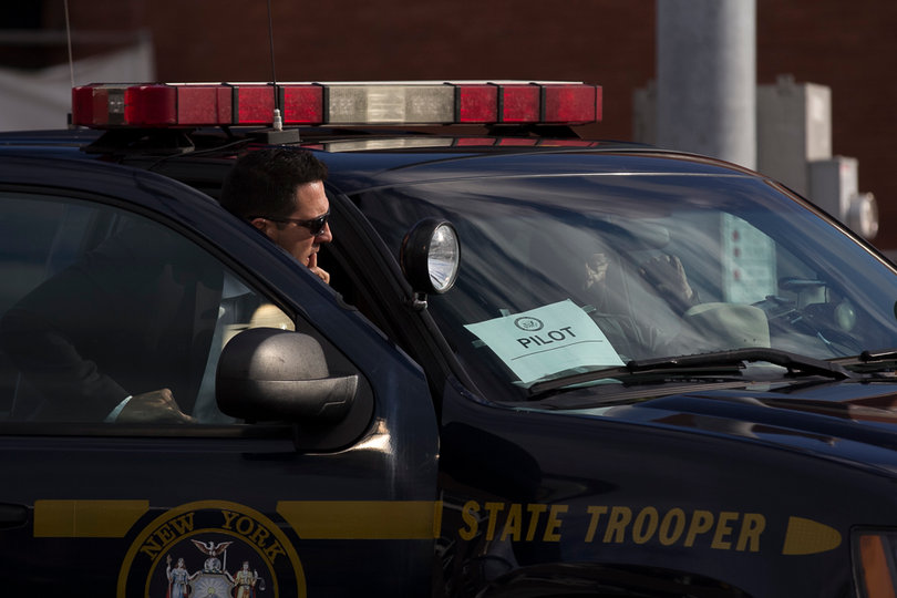 State Troopers prepare to start the motorcade for Biden's departure.