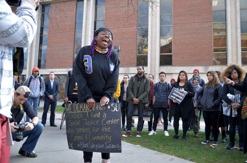 One of the leaders of the protest called out to the crowd gathered near the Physics Building, expressing her concern about discrimination on the SU campus.