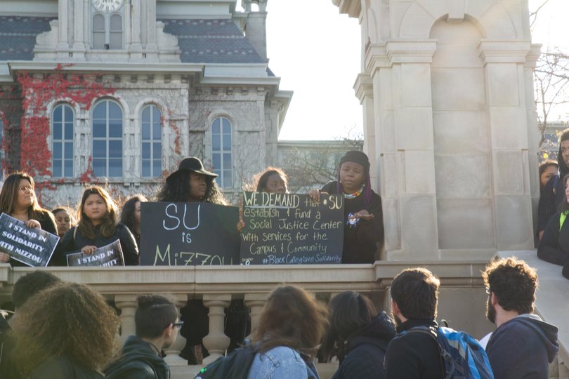 After gathering in the Schine Student Center, protestors stood around the stairs in front of the Hall of Languages.