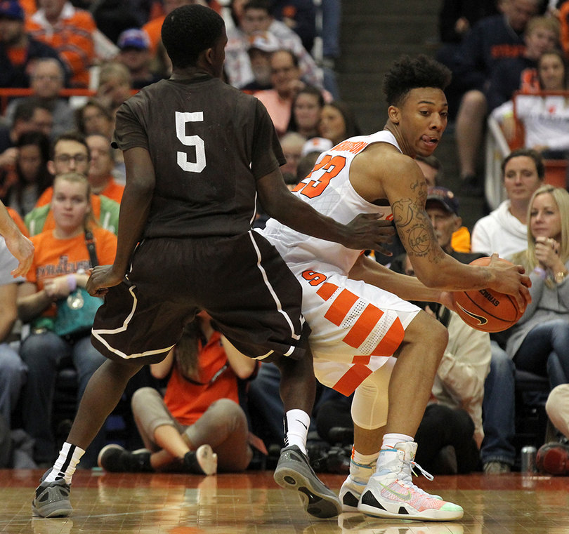 Syracuse freshman Malachi Richardson holds the ball away from a Lehigh defender trying to encroach his space.