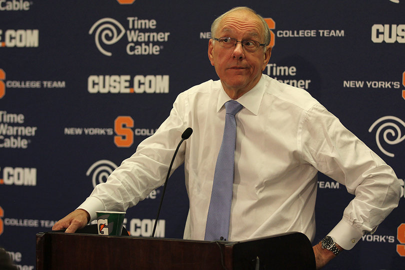 Boeheim smirks answering a question during his postgame press conference on the heels of SU's season-opening win.
