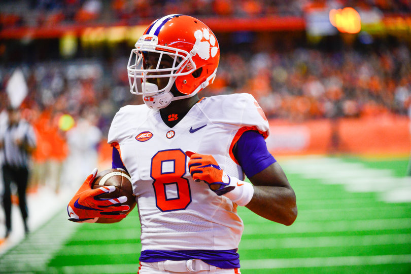 Cain carries the ball and looks to his right. He scored a touchdown against Syracuse.