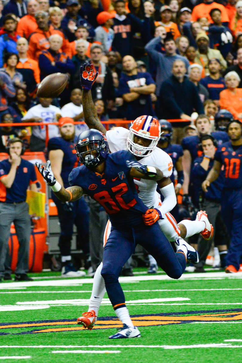 The ball flies over the head of Alvin Cornelius.