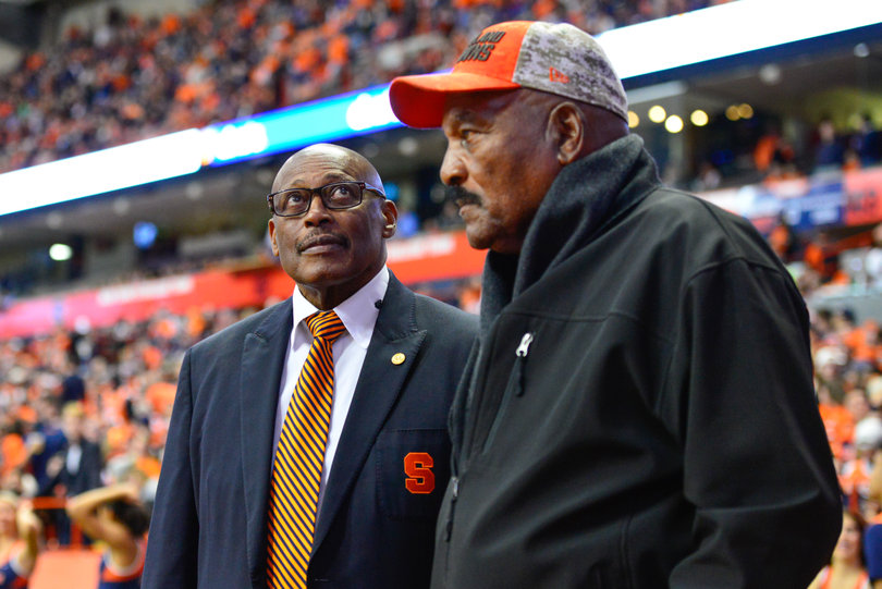 Former Syracuse legends Floyd Little (left) and Jim Brown watch the game from the sideline.
