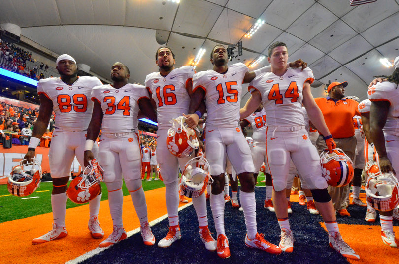 Five Clemson players lock arm-to-arm after that win. 