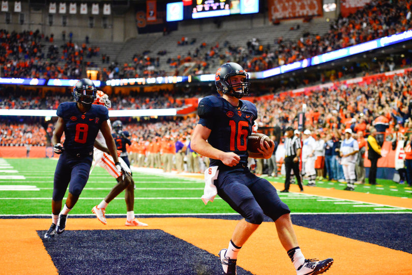 Mahoney, the once-fifth-string quarterback looks into the crowd after scoring a touchdown.