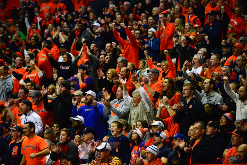 Fans cheer during the close contest. For the second consecutive season, SU lost to national powerhouse Clemson by just 10 points.
