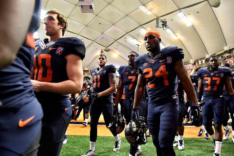 Shyheim Cullen (24) walks off the field with the rest of the Syracuse team.