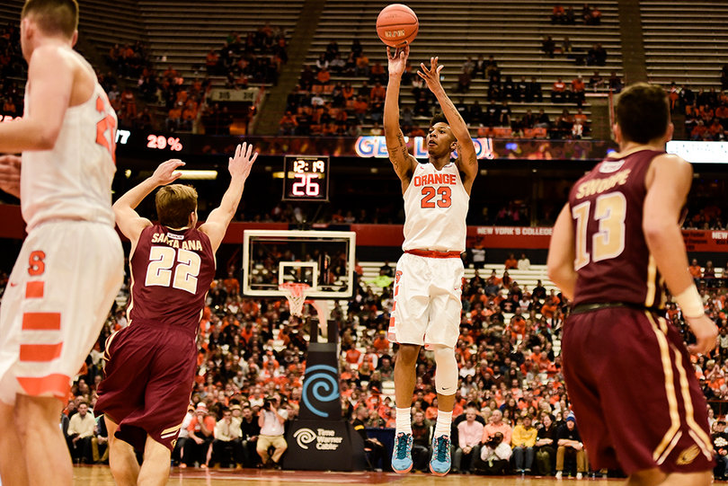 Richardson rises up for a shot above Elon guard Steven Santa Ana. He struggled from the field, shooting just 1-of-7. 