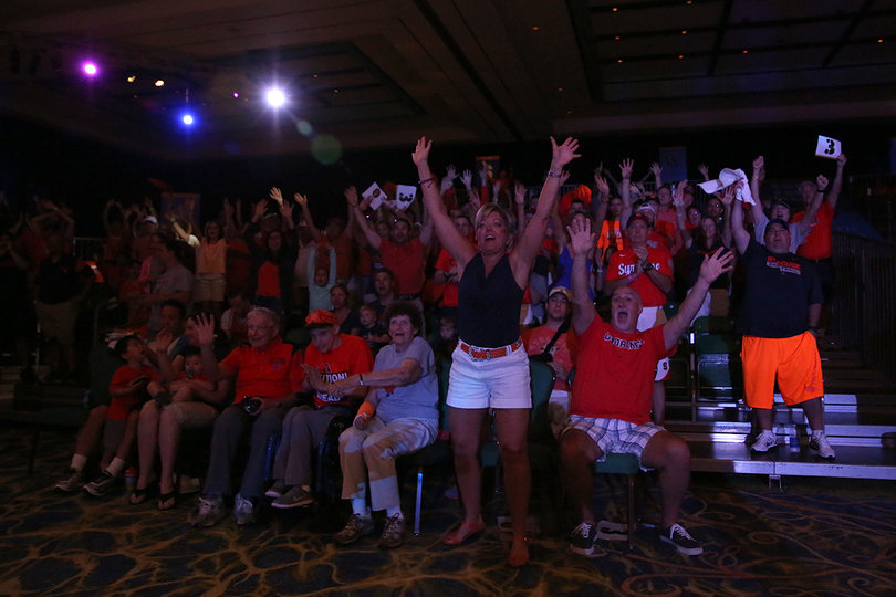 SU fans cheer on the Orange. The game was played inside a ballroom at the Atlantis Paradise Island Resort.